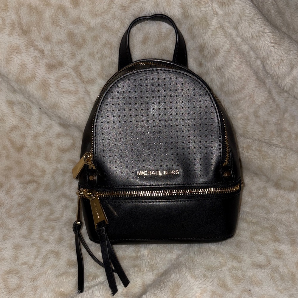 Michael Kors Black and Gold Perforated Backpack